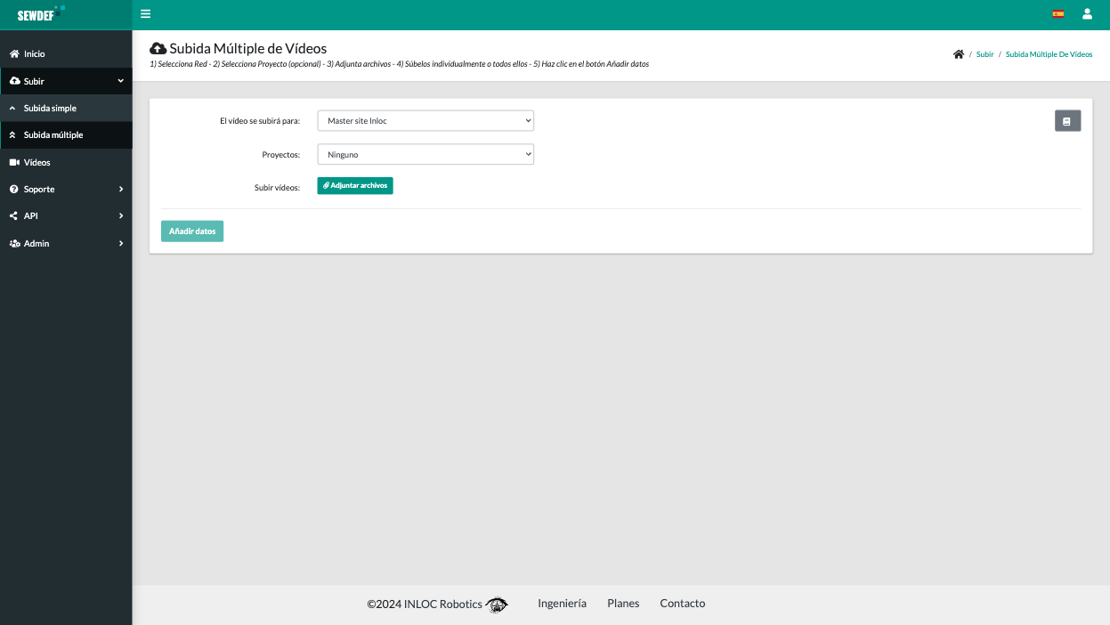 Formulario antiguo de subida múltiple de vídeos: dos desplegables y un botón de adjuntar archivos, sin guía de pasos ni manejo visible de errores